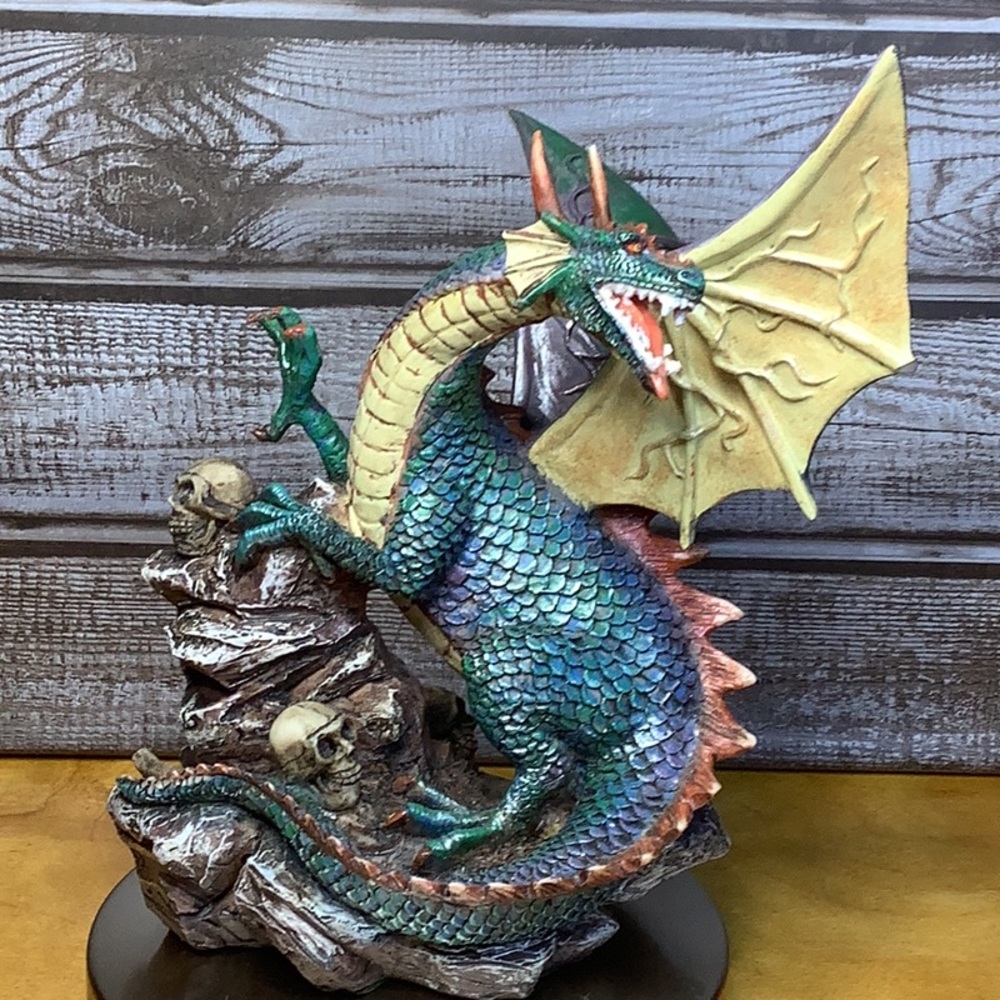 Dragon and skulls statue